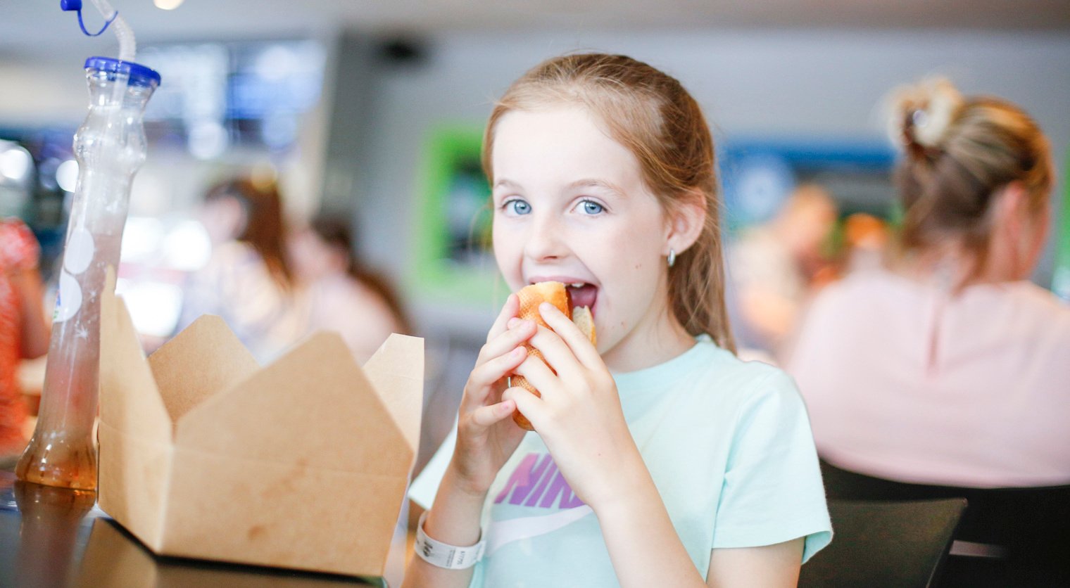 A child enjoying a meal at a Flip Out UK Diner