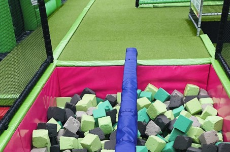 Balance beam over foam pit at Flip Out UK